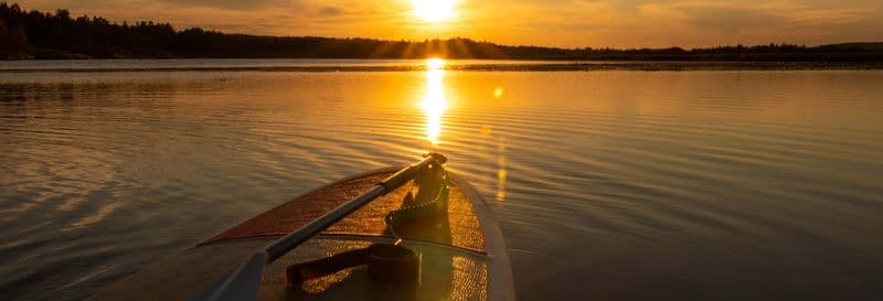 Paddle sous le soleil de minuit à Rovaniemi