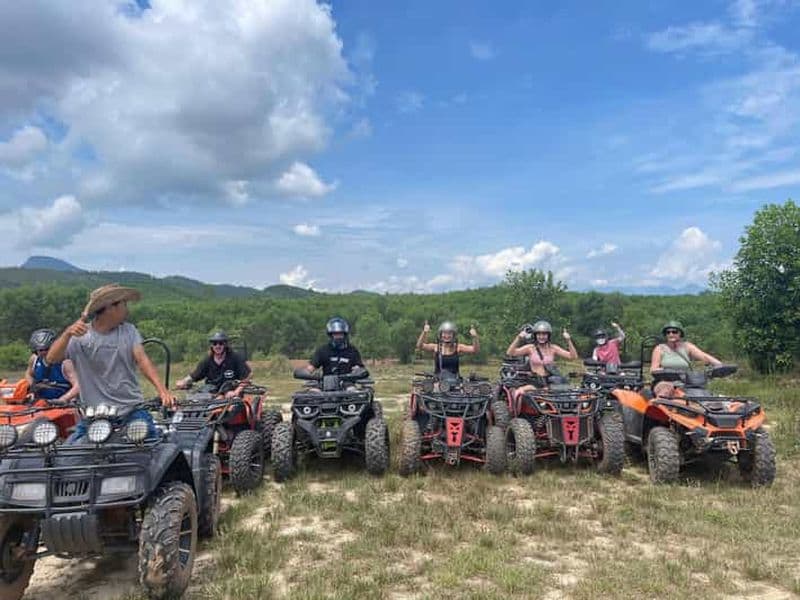 Balade en quad dans la campagne de la vieille ville de Hoi An avec la forêt de cocotiers