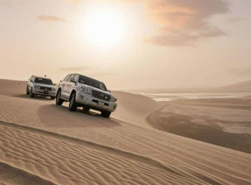 Doha : Safari dans le désert de la mer intérieure, balade à dos de chameau et planche à voile