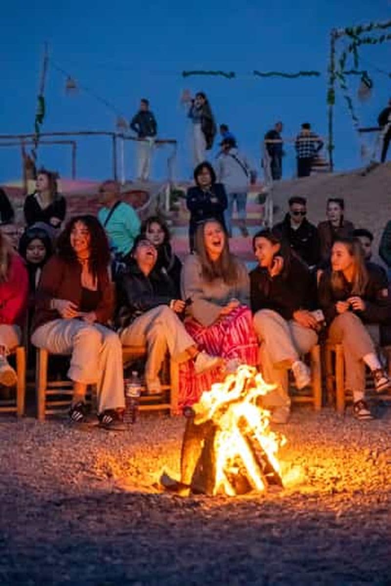 Billet Au départ de Marrakech : Excursion dans le désert au coucher du soleil avec balade à dos de chameau et dîner