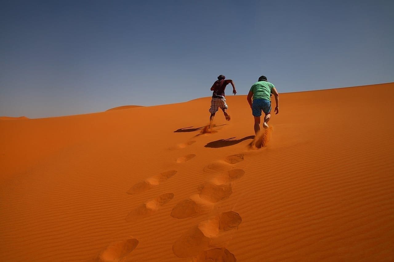 Billet Aventure dans le désert d'Agadir avec planche à voile, promenade à dos de chameau au coucher du soleil et barbecue