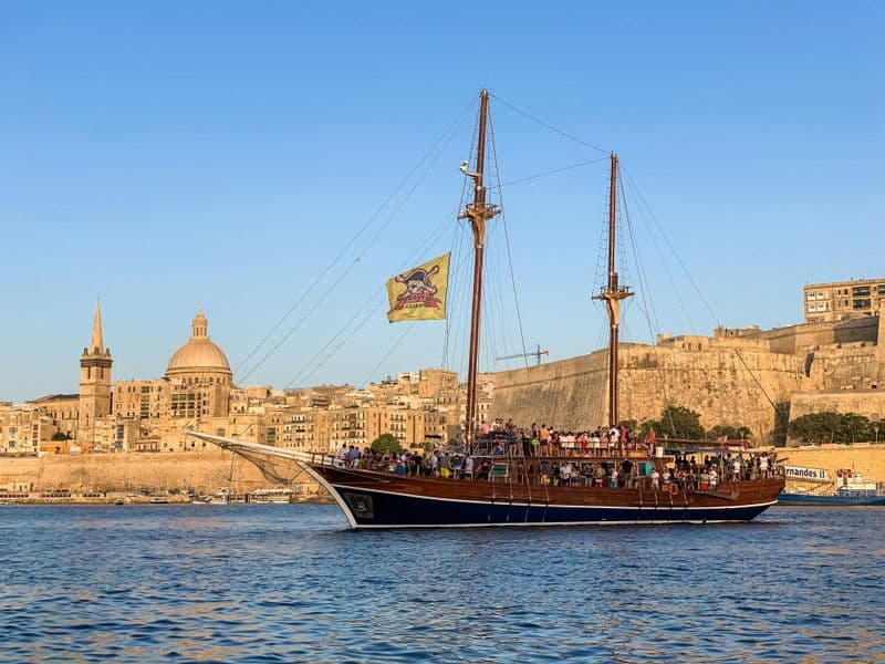 Pirate boat party with DJ, drinks and night swim in Malta