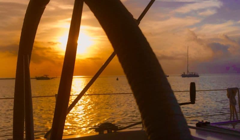 Billet Location de bateau - Coucher de soleil en voilier (Sailboat)