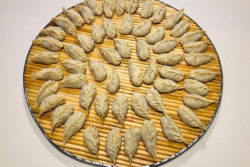 Cours de cuisine chinoise avec expérience du badminton à Beijing