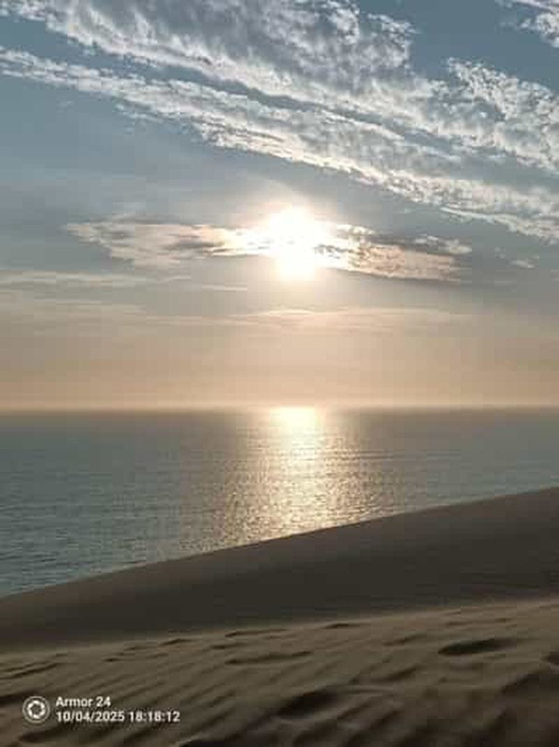 Billet Sandwich Harbour : coucher de soleil, dunes et océan