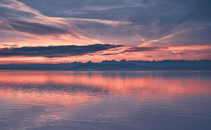 Billet Lac de Neuchâtel : sortie en bateau au coucher du soleil en petit groupe