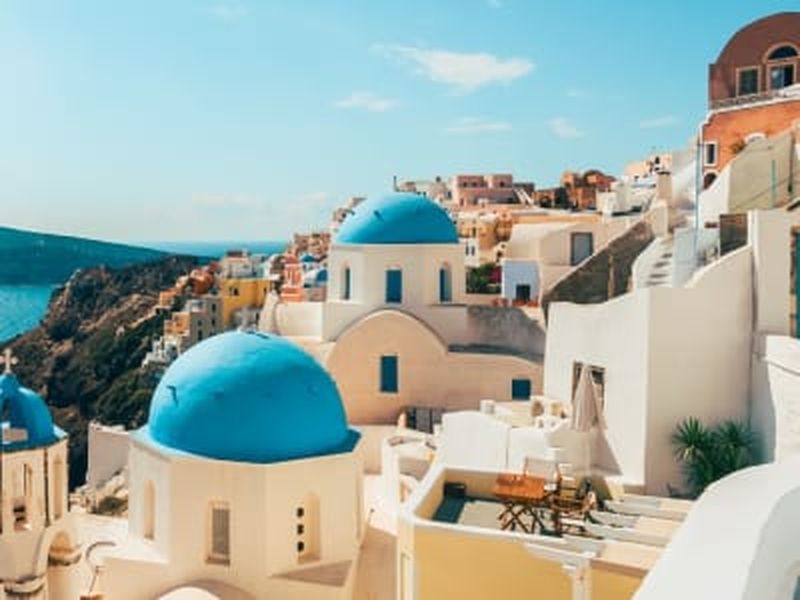 Billet Vol en hélicoptère au coucher du soleil au-dessus de Santorin depuis Fira