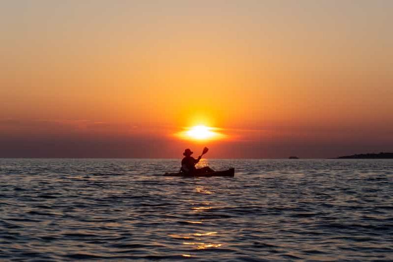 Billet Pula : excursion au coucher du soleil en kayak transparent, grotte, baignade et saut de falaise