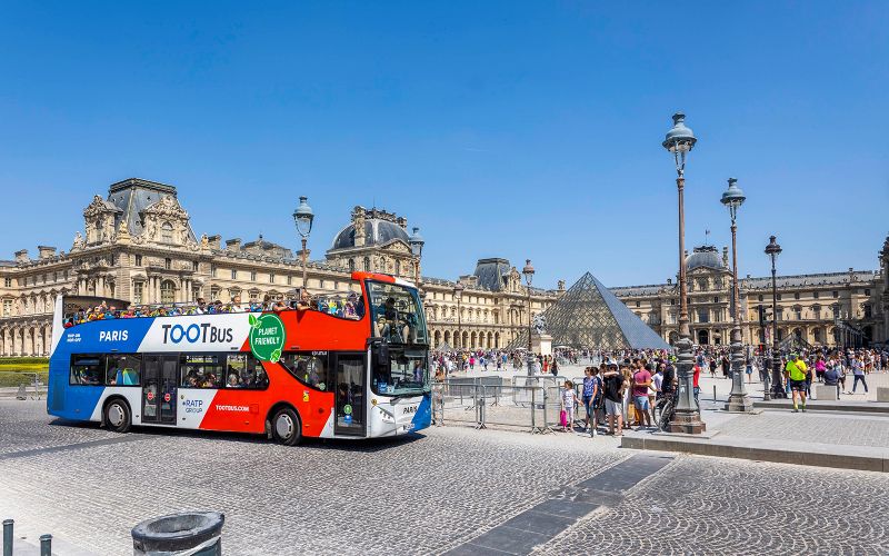 Billet Tootbus : Tour en bus Hop-On Hop-Off à Paris avec croisière sur la Seine en option