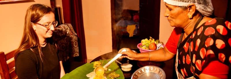 Cours de cuisine et dîner avec une famille indienne à Munnar