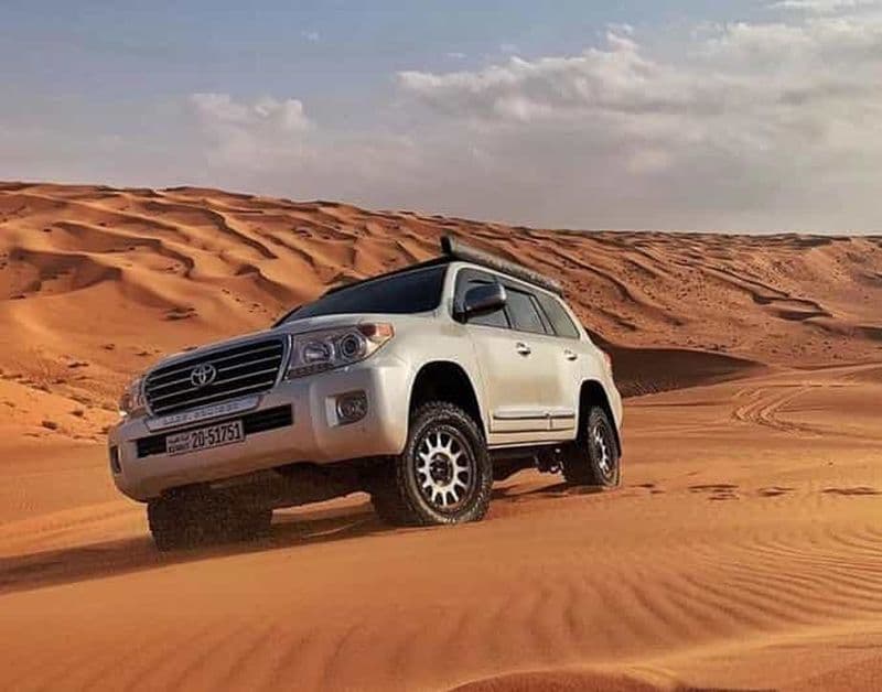 Doha : Safari dans le désert au coucher du soleil Balade à dos de chameau et planche à voile