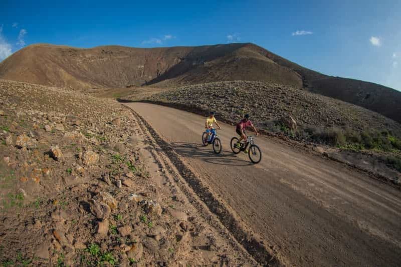 Corralejo : Location de vélos électriques et carte de la plage de Popcorn