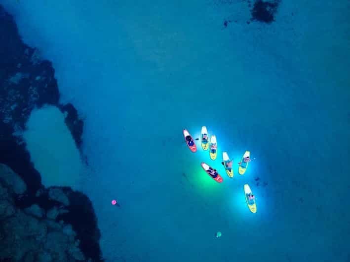Paddle Surf avec lumières Led au coucher du soleil à Minorque
