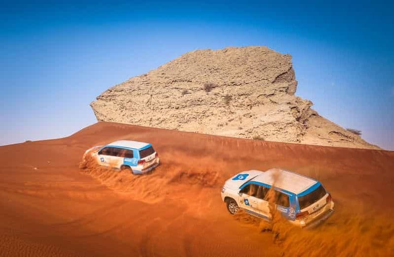 Dubaï : safari dans les dunes rouges avec quad, sandboard et chameaux