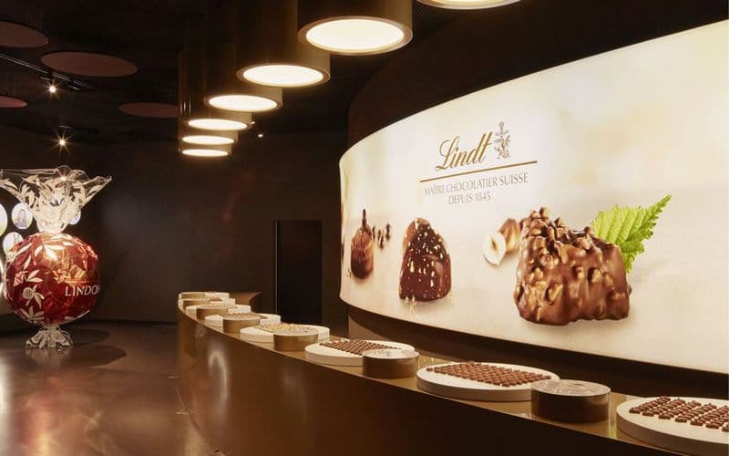 Visite d'une demi-journée de Zürich avec Lindt Home Of Chocolate et croisière touristique