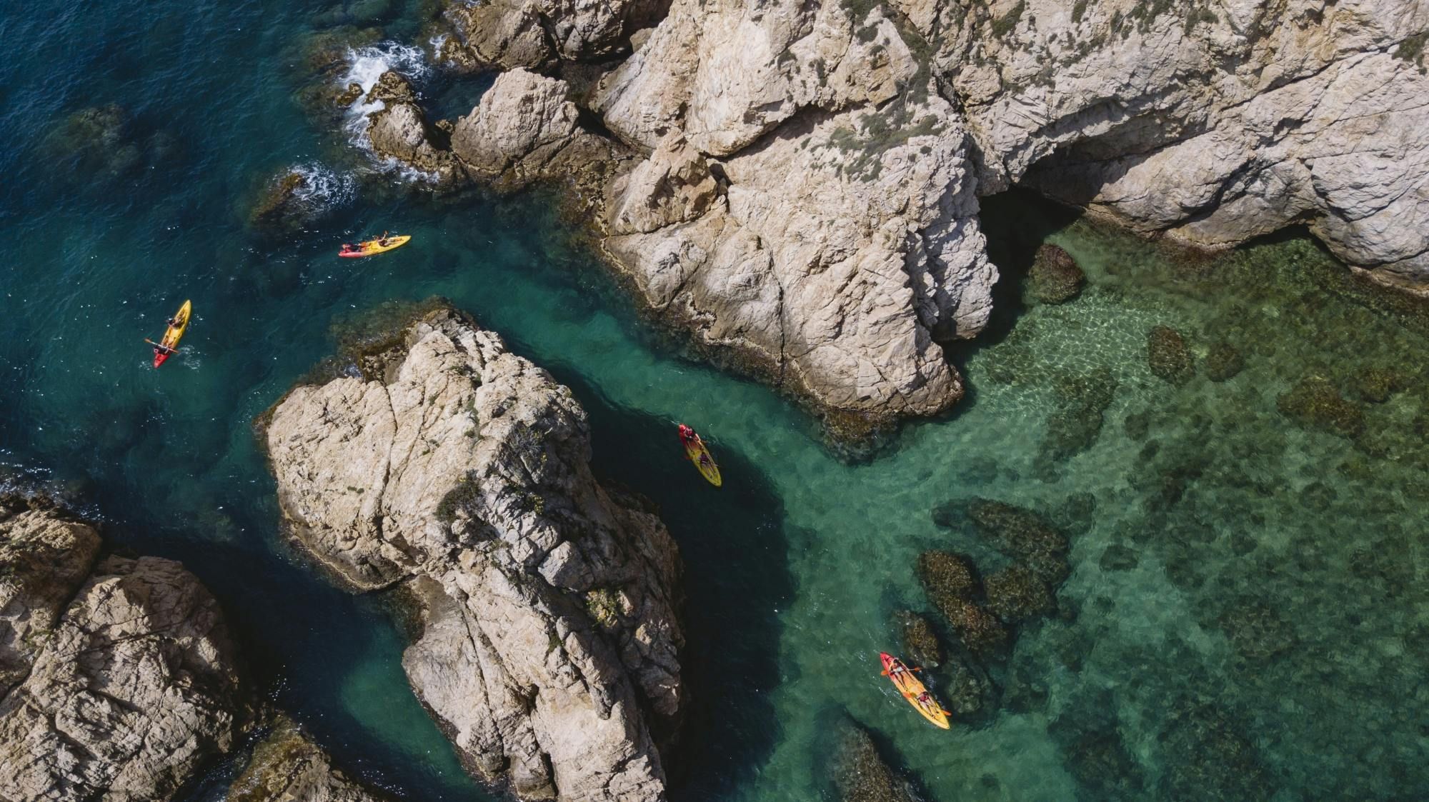 Kayak and snorkel in Tossa de Mar with three course meal
