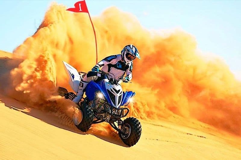 Expérience de VTT et de quad au Qatar avec sandboard