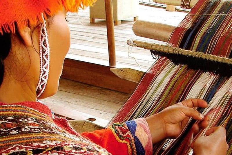 Leçons d'alpaga et de tissage textile et visite shopping de Cusco"