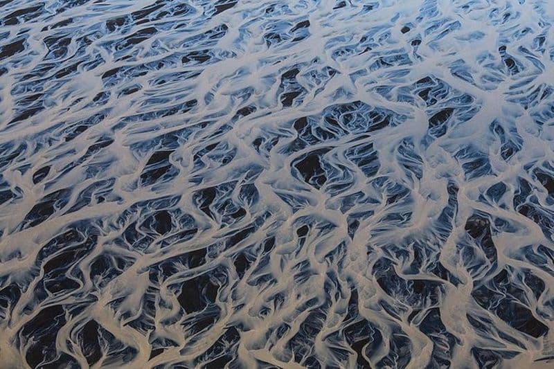 Excursion en avion au-dessus du sable noir et du lit des rivières au départ de Skaftafell